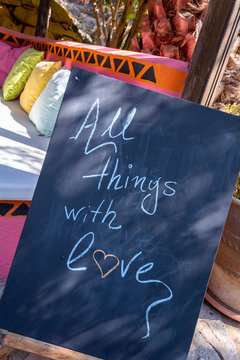 Sign at Cafe del Mundo Potami Beach Karlovassi Samos Greece