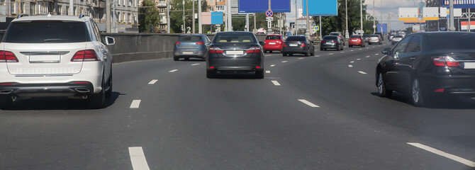 Car traffic on a multi-lane street in the city
