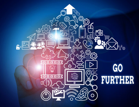 Conceptual hand writing showing Go Further. Concept meaning To move to a greater distance or overcome your limitations Male wear formal suit presenting presentation smart device