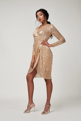 Beautiful sexy lady fashion pretty woman model pose wear shine gold silk shiny dress collection...