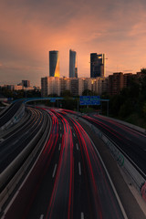 Fototapeta na wymiar Highway and Madrid's four towers, Spain.