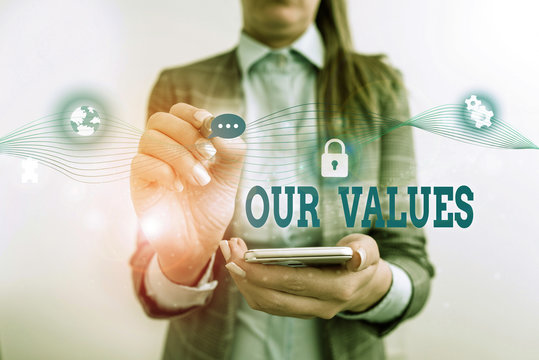 Word writing text Our Values. Business photo showcasing list of morals companies or individuals commit to do them Female human wear formal work suit presenting presentation use smart device