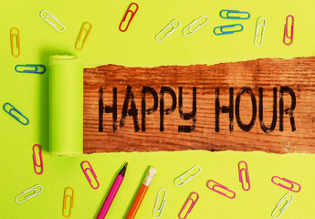 Conceptual hand writing showing Happy Hour. Concept meaning Spending time for activities that makes...