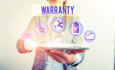 Conceptual hand writing showing Warranty. Concept meaning Free service of repair and maintenance of...