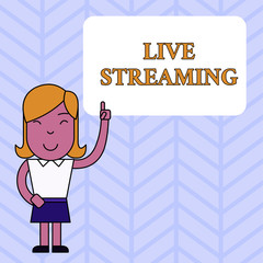 Conceptual hand writing showing Live Streaming. Concept meaning Transmit live video coverage of an event over the Internet Woman Standing with Raised Left Index Finger Pointing at Box
