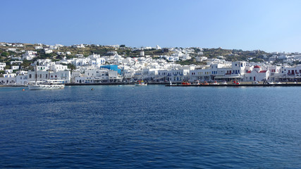 Picturesque port and main village of Mykonos island with traditional fishing boats and beautiful sunny weather, Cyclades, Greece