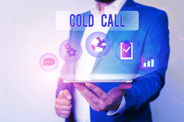 Text sign showing Cold Call. Business photo text Unsolicited call made by someone trying to sell goods or services Male human wear formal work suit presenting presentation using smart device