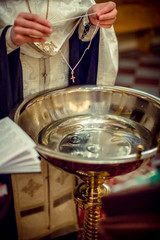 baptismal font. Accessories for the christening of children icons of candles, the Ortodox Church