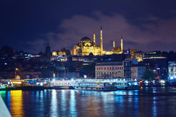 Fototapeta na wymiar Night view to Suleymaniye Cami, from Galata Bridge, Istanbul