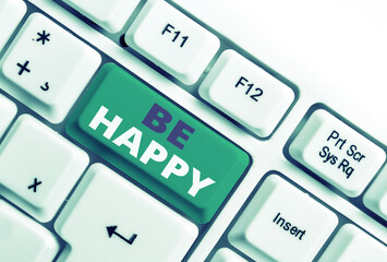 Word writing text Be Happy. Business photo showcasing live every moment as the last love your life work family White pc keyboard with empty note paper above white background key copy space