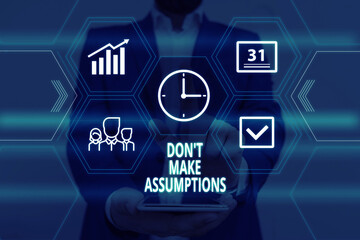 Text sign showing Don T Make Assumptions. Business photo showcasing putting plan in future with percentage happening Male human wear formal work suit presenting presentation using smart device