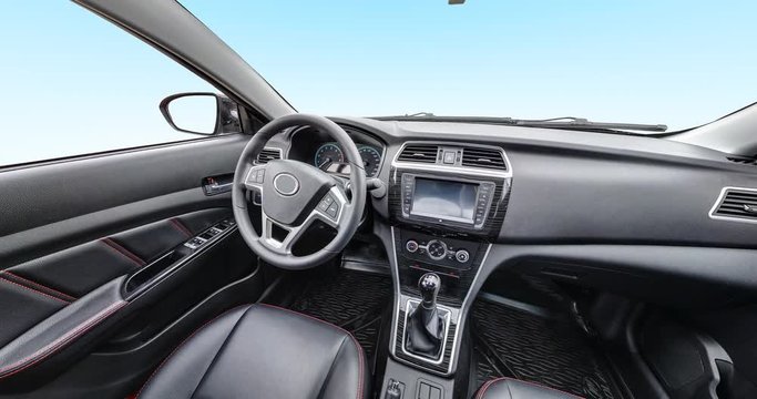 panorama in interior leather salon of prestige modern car. steering wheel, shift lever and dashboard H