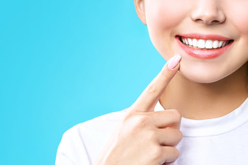 Perfect healthy teeth smile of a young woman. Teeth whitening. Dental clinic patient. Image symbolizes oral care dentistry, stomatology. Dentistry image.