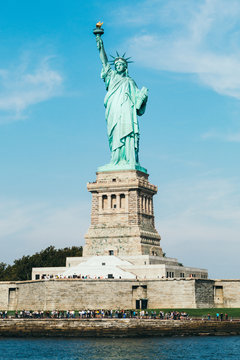 Front view of statue of Liberty in New York . Vertical image