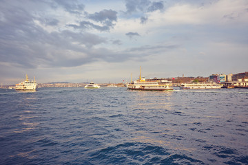 Fototapeta premium A picturesque view of Istanbul and the Galata Tower from the side of the Bay of Bosphorus
