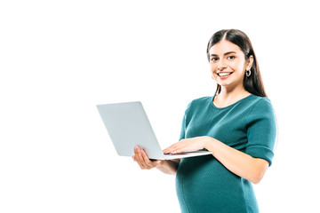 smiling pregnant girl holding laptop isolated on white