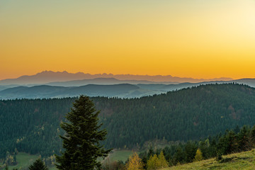 Mountains Tatry in the background at sunset in autumn