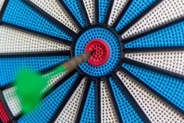 Dart hitting in the target center