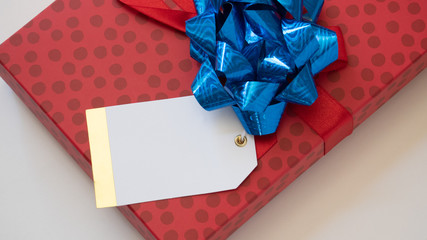 Holiday package wrapped with blank tag