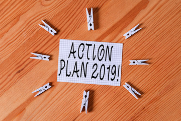 Conceptual hand writing showing Action Plan 2019. Concept meaning proposed strategy or course of...