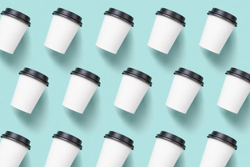 Pattern of paper cups of coffee on a decorative background.