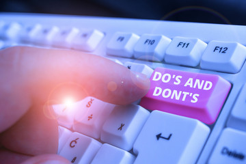 Writing note showing Do S Is And Dont S Is. Business concept for advising Rules or customs...