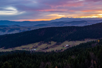 Obraz premium Mountains Tatry in the background at sunset