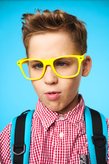 portrait of a boy in glasses