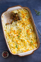 Shepherd's Pie or Cottage Pie. Casserole in baking dish. Overhead vertical image