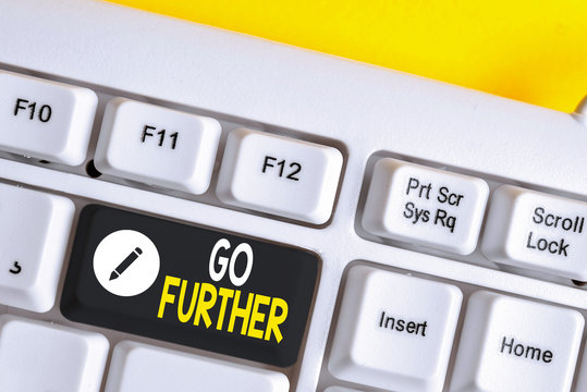 Writing note showing Go Further. Business concept for To move to a greater distance or overcome your limitations White pc keyboard with note paper above the white background