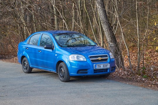BRNO, CZECHIA - NOVEMBER 24, 2019: Blue Chevrolet aveo compact sedan budget car parked on a roadside. Previously branded as Daewoo, successor of Daewoo Lanos