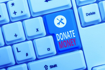 Conceptual hand writing showing Donate Money. Concept meaning to give money or goods to help a...