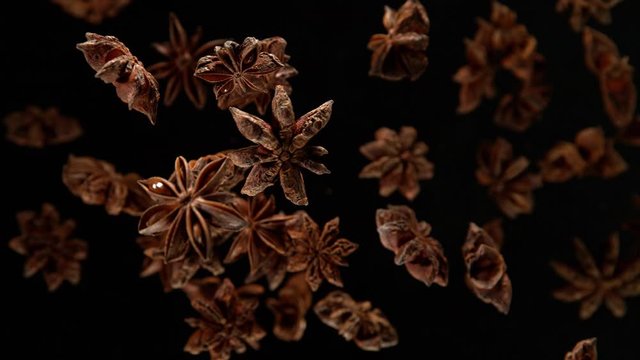Super Slow Motion Shot of Star Anise Explosion on Black Background at 1000fps