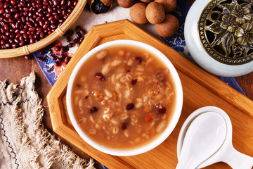 Eight treasure porridge on white wooden table  
