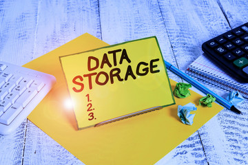 Conceptual hand writing showing Data Storage. Concept meaning the act of archiving data in...