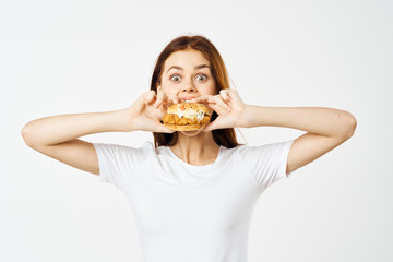 young woman with hamburger