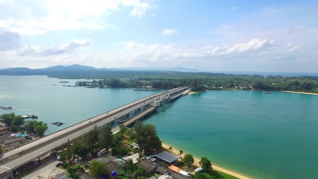 aerial view Sarasin bridge connect Phang Nga province to Phuket island.  The old bridge was renovated to be a tourist attraction and a viewpoint in the middle of the sea.