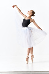 young ballet dancer posing in studio