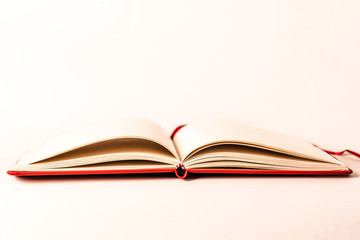 Close up open books on white background