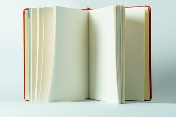 Close up open white paper books on white background
