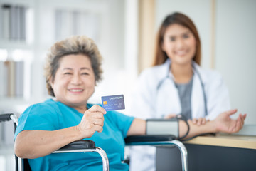 Patients show credit card for medical treatment.