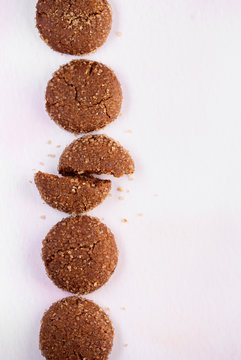 Overhead View Of Molasses Cookies On A Pink Surface With Copy Space