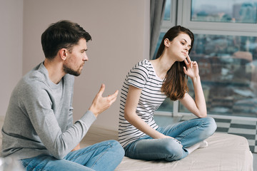 young couple talking on cell phone