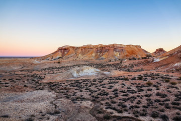 Fototapeta na wymiar Colourful Sunset over The Painted Desert, Arckaringa Hills, South Australia, Australia