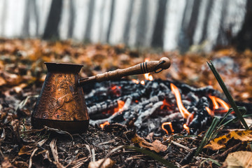 Making coffee at the stake. Make coffee or tea on the fire of nature. Burned fire. A place for fire.