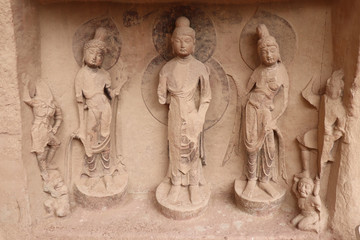 Fototapeta na wymiar Buddhist sculpture in Bingling Temple and grottoes, Yongjing, Gansu Province, China.UNESCO World heritage site.(Silk Roads: the Routes Network of Chang'an-Tianshan Corridor)