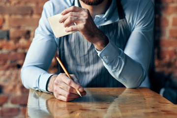 man with cigar and cup of coffee