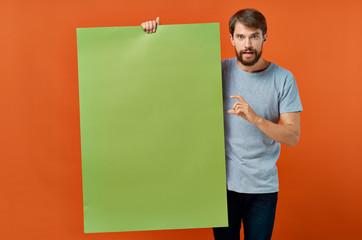 man holding a blank board