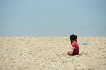 Kids playing on beach. Children play at sea