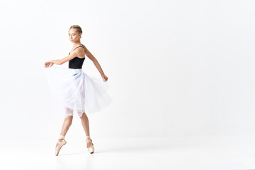 young ballet dancer in action isolated on white background